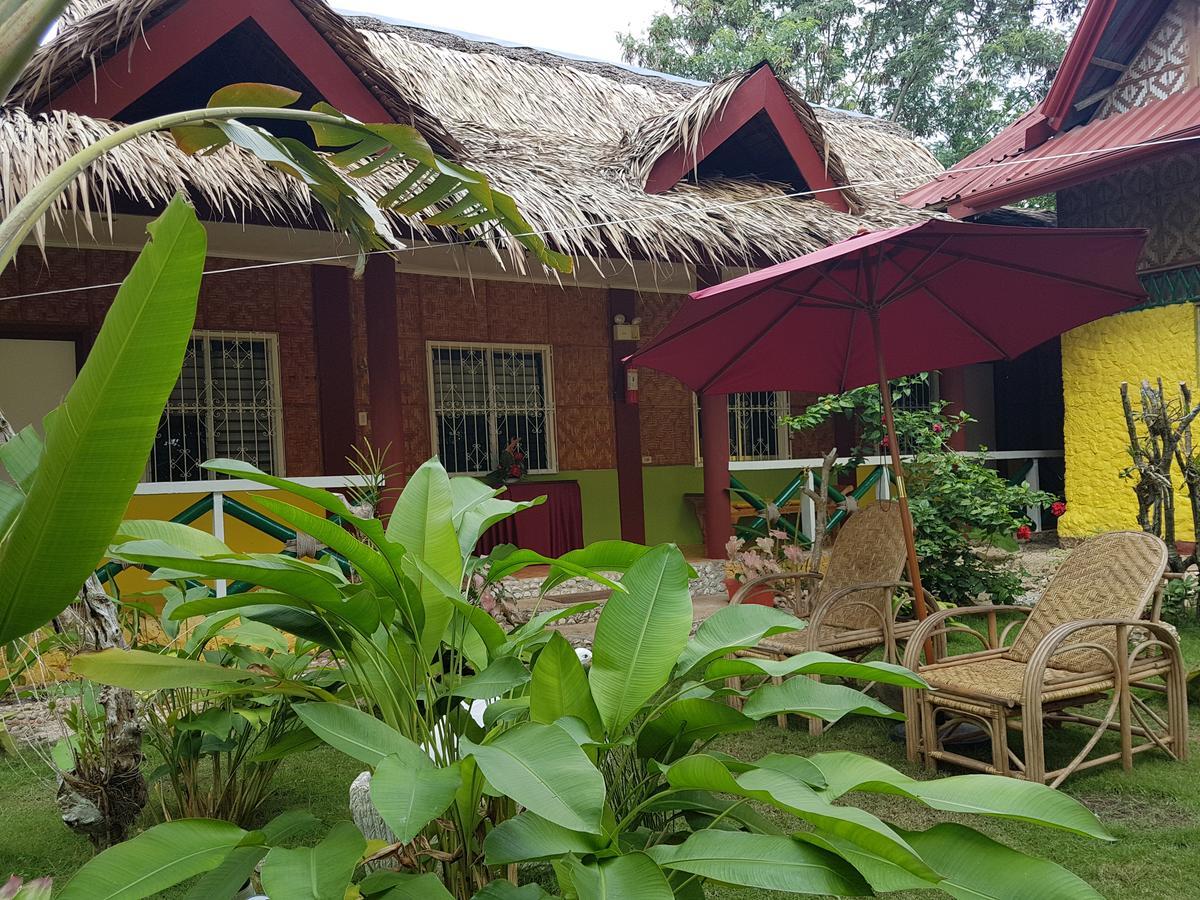 פנגלאו Traville Huts Palm Beach Inn מראה חיצוני תמונה