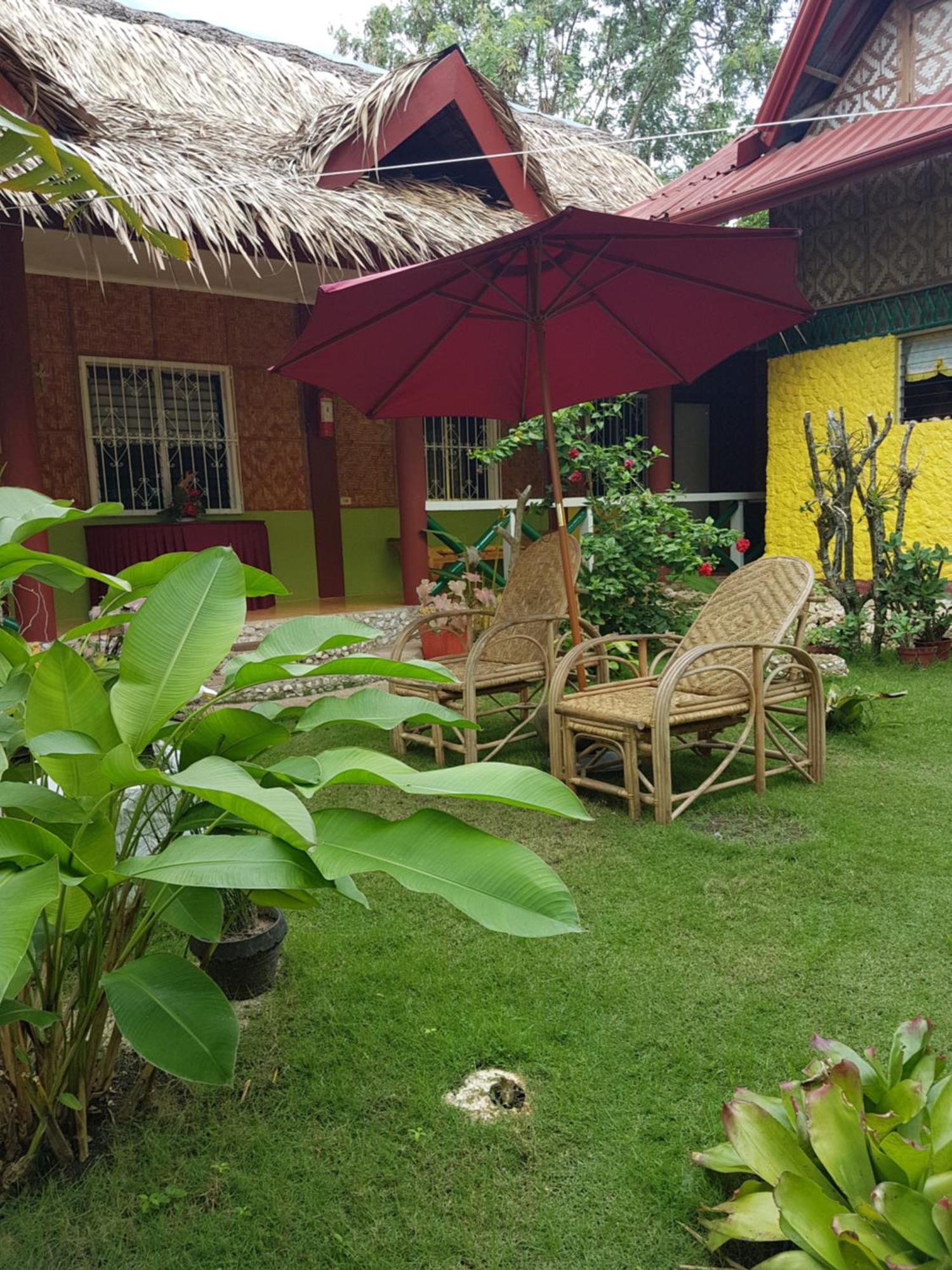 פנגלאו Traville Huts Palm Beach Inn מראה חיצוני תמונה