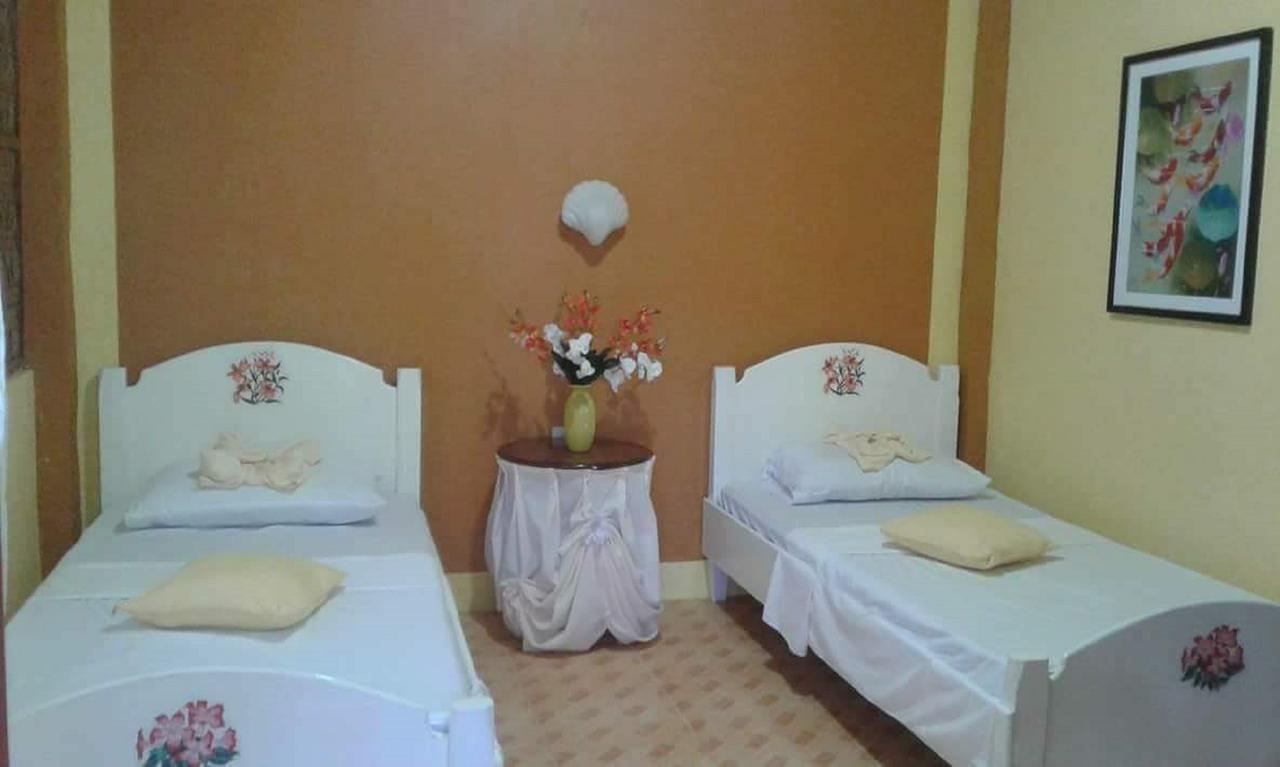 פנגלאו Traville Huts Palm Beach Inn מראה חיצוני תמונה