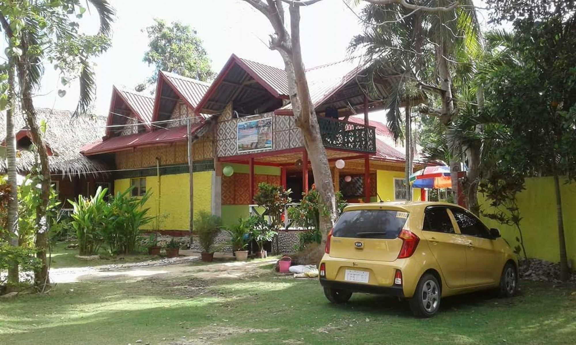 פנגלאו Traville Huts Palm Beach Inn מראה חיצוני תמונה