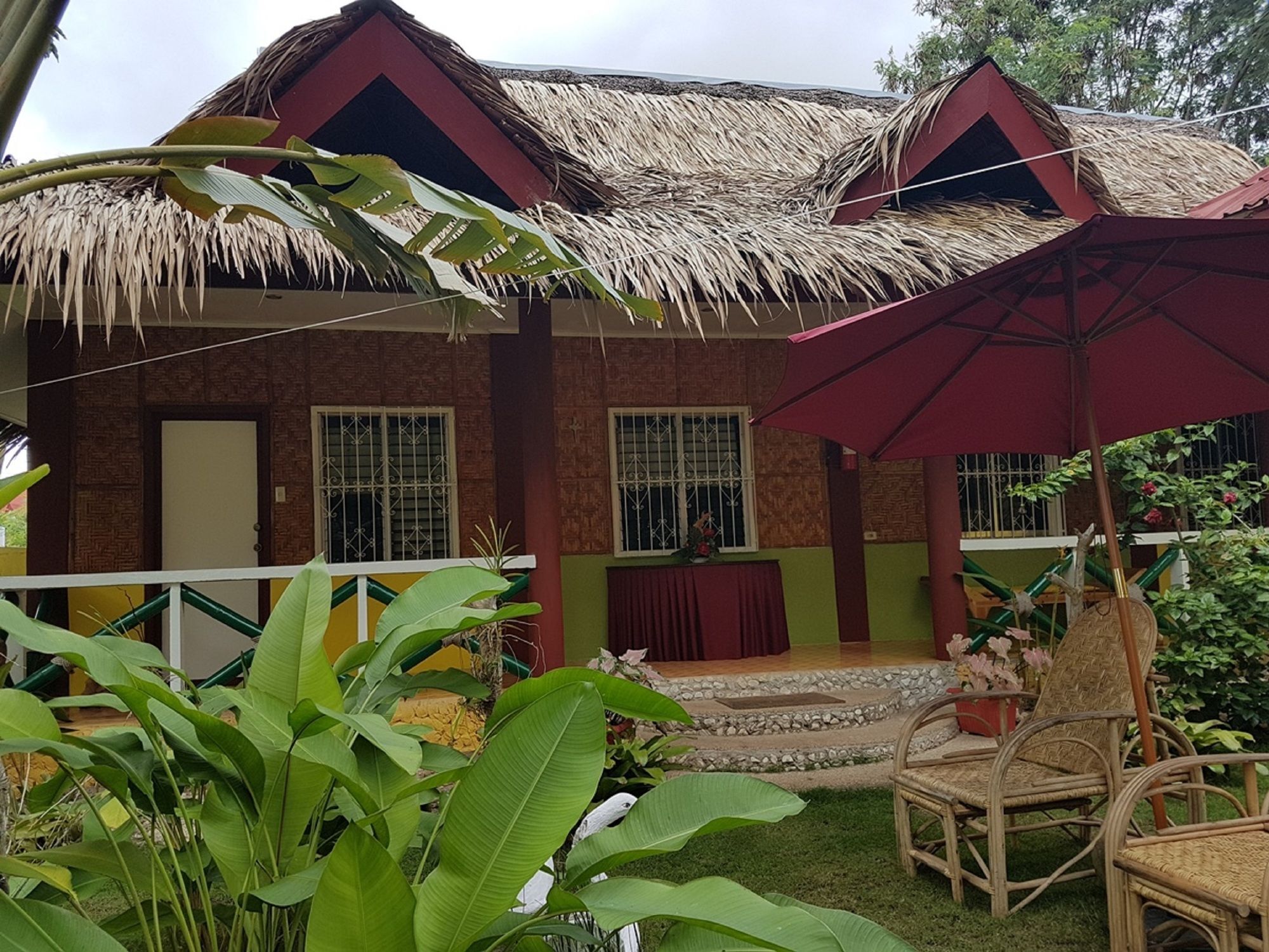 פנגלאו Traville Huts Palm Beach Inn מראה חיצוני תמונה