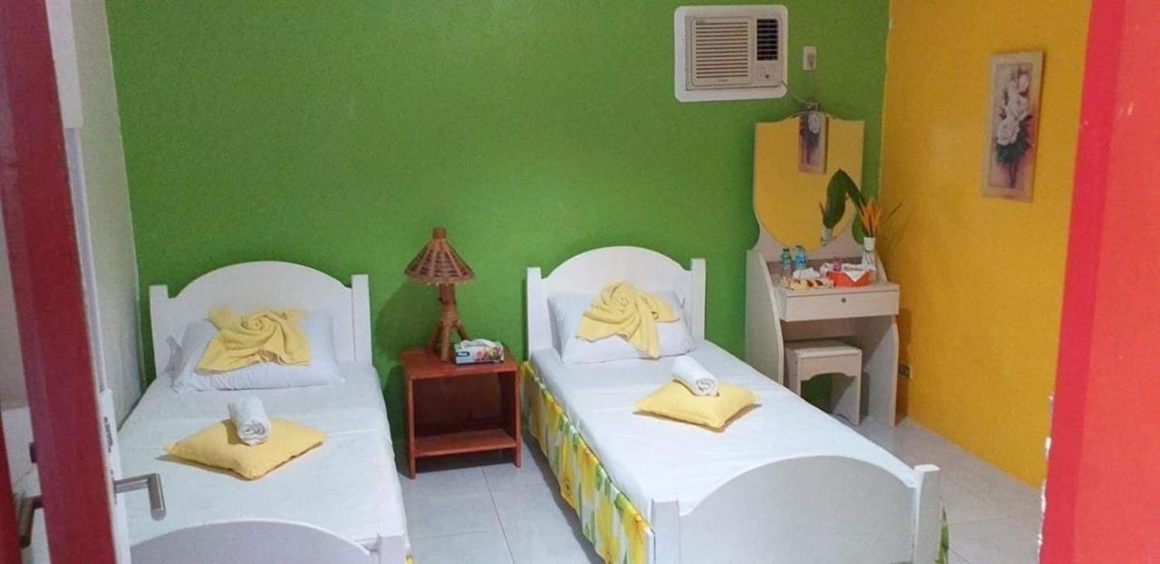 פנגלאו Traville Huts Palm Beach Inn מראה חיצוני תמונה